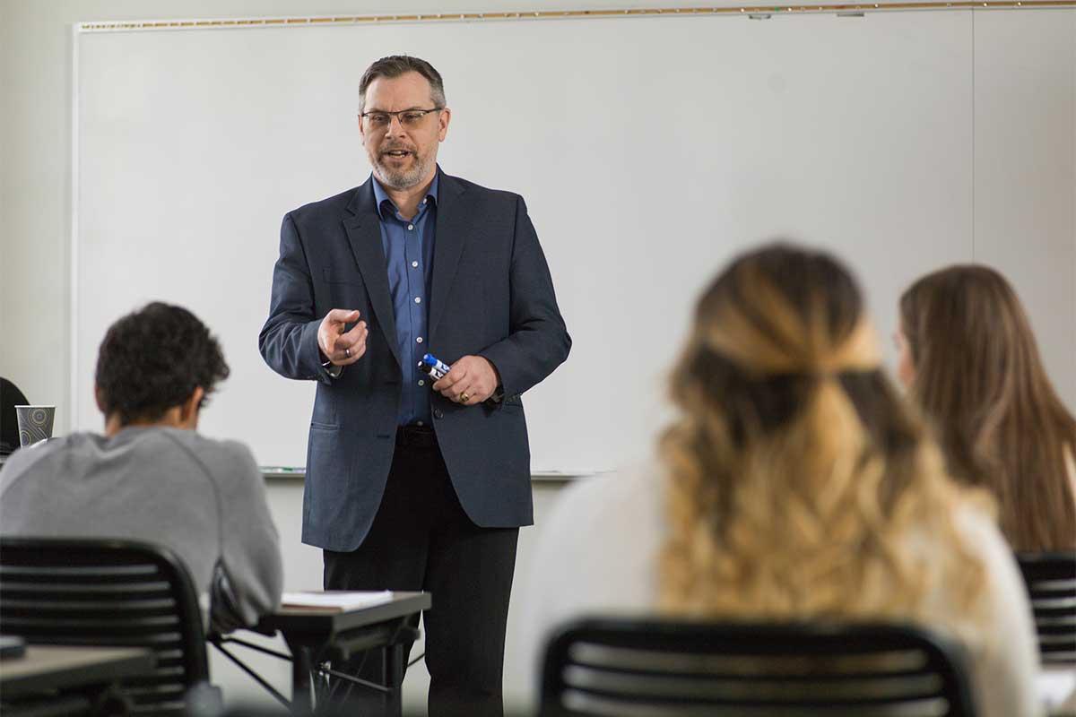 Students listening to a lecture in a clasroom